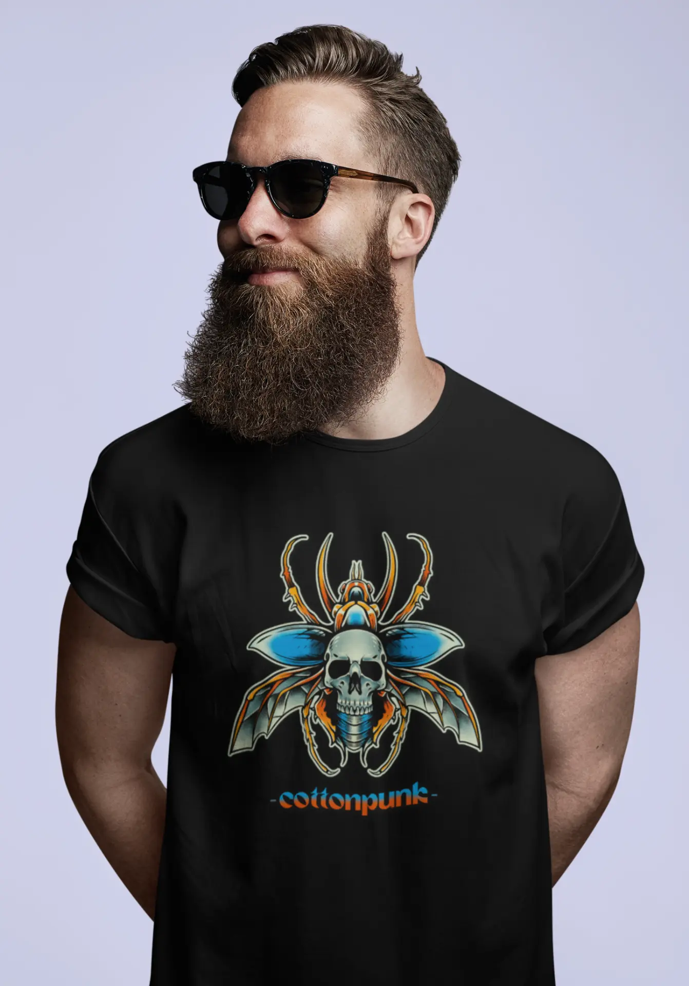 Beetlejuice skull chest print on a black Cottonpunk t-shirt