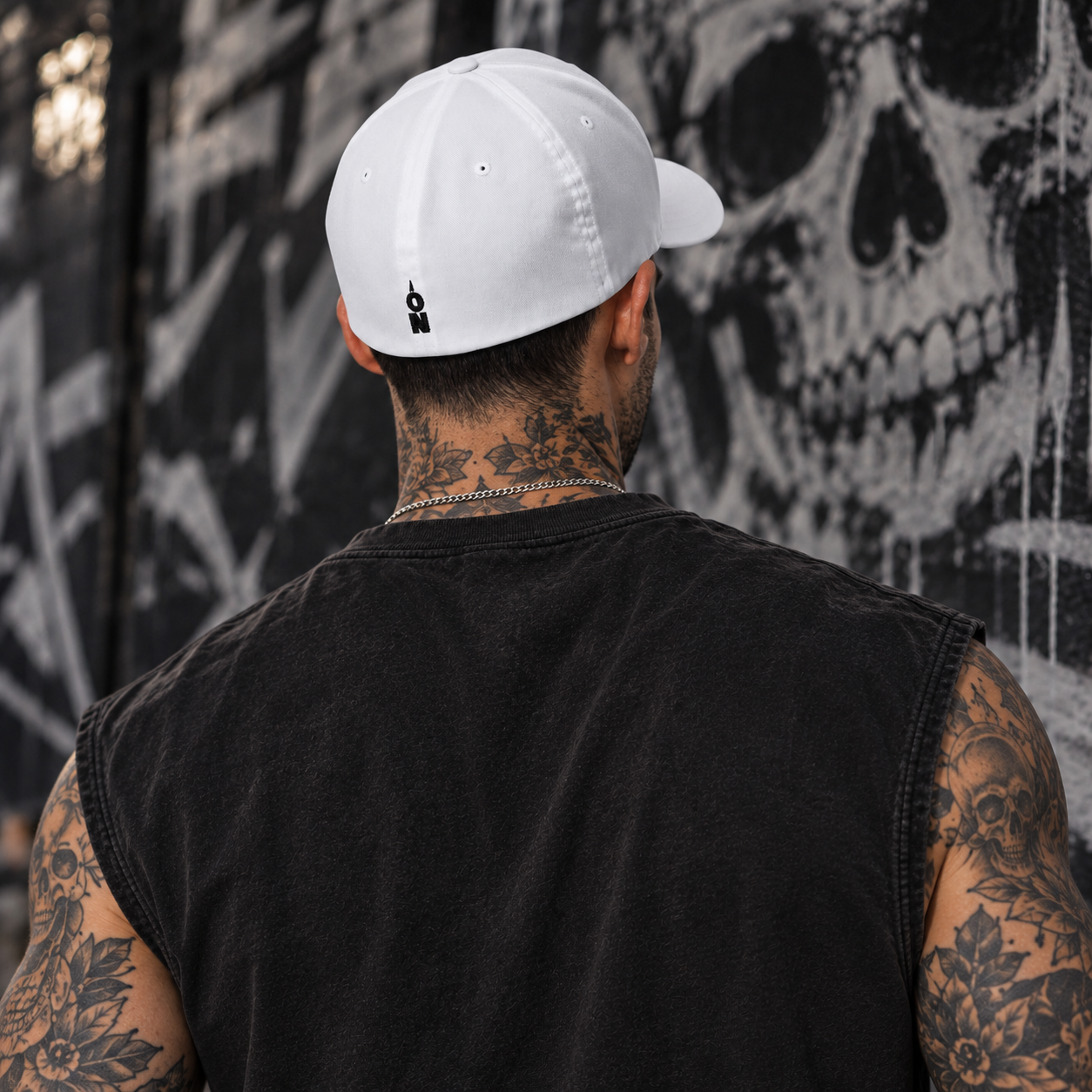 CPT Onyx Cap in white worn by a male model, back view